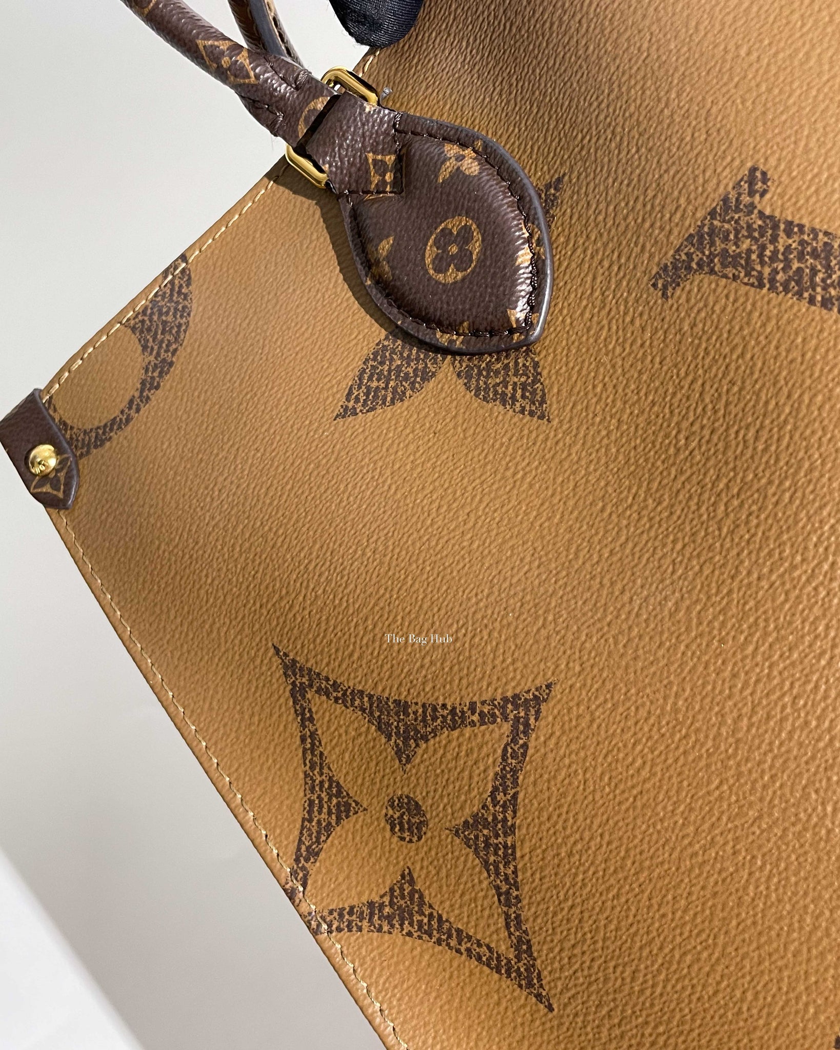 Louis Vuitton Reverse Monogram OTG MM Tote Bag