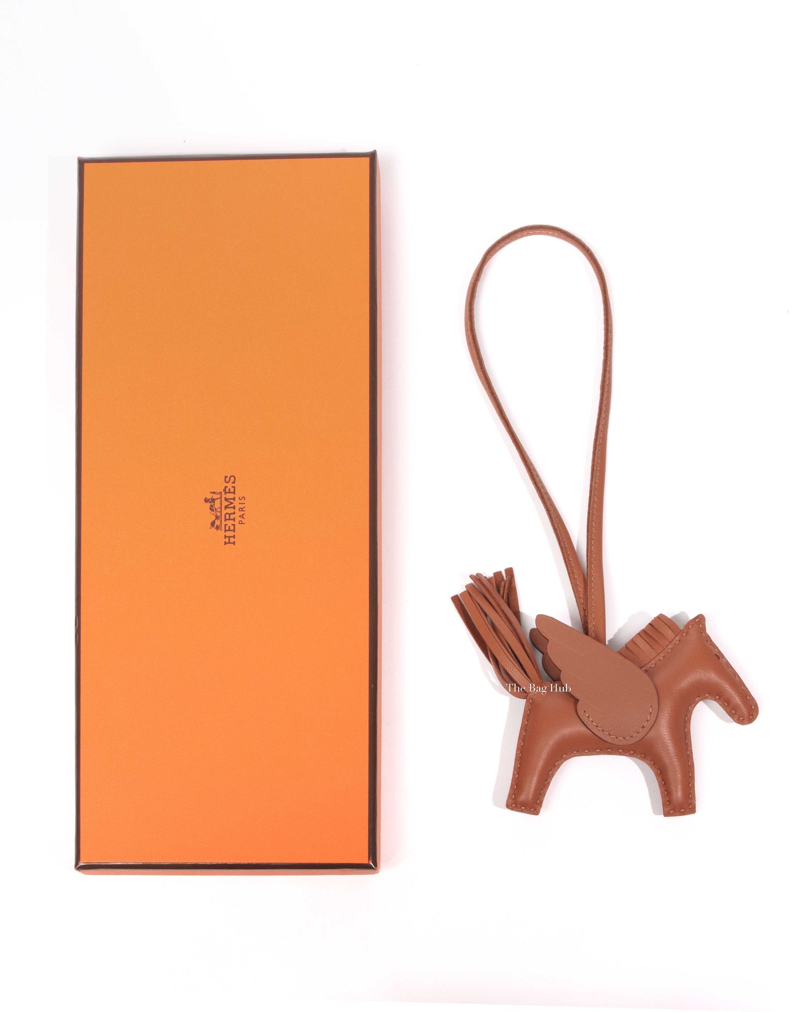 HERMÈS Rodeo Pegase PM charm in Orange, Cuivre and Beton Swift  leather-Ginza Xiaoma – Authentic Hermès Boutique