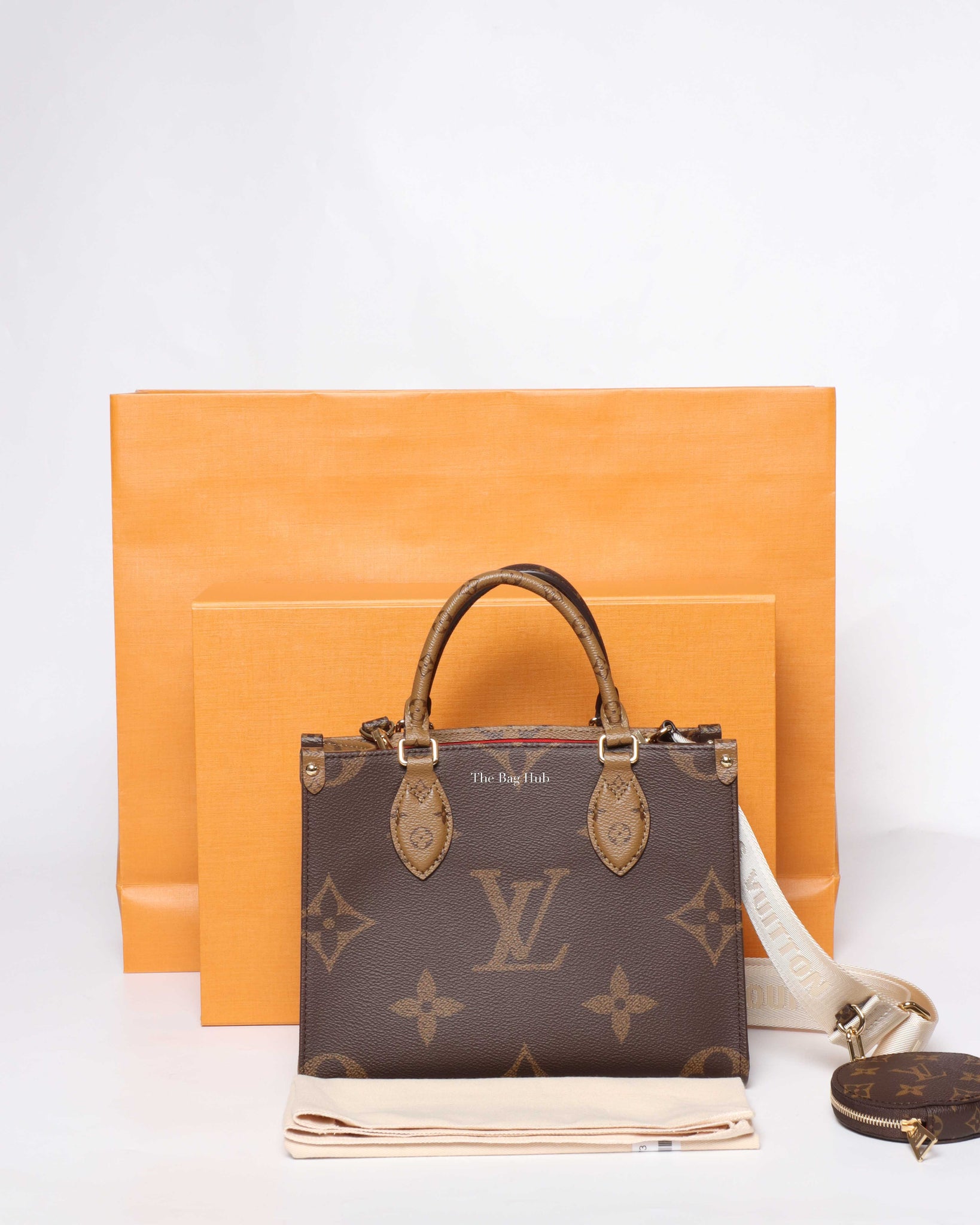 Louis Vuitton Monogram Reverse OTG PM-14