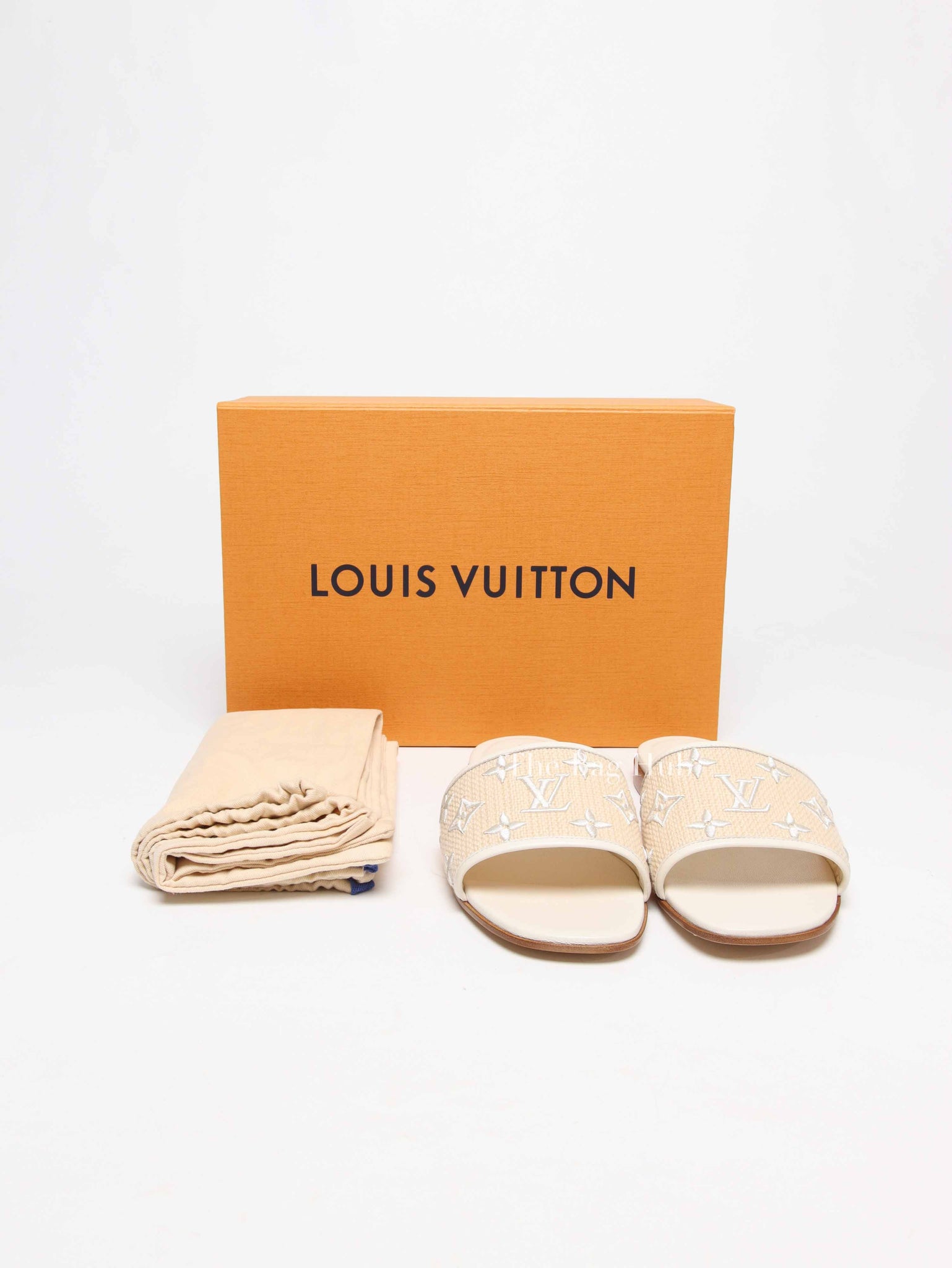 Louis Vuitton White Monogram Embossed Canvas Revival Flat Mules Size 39