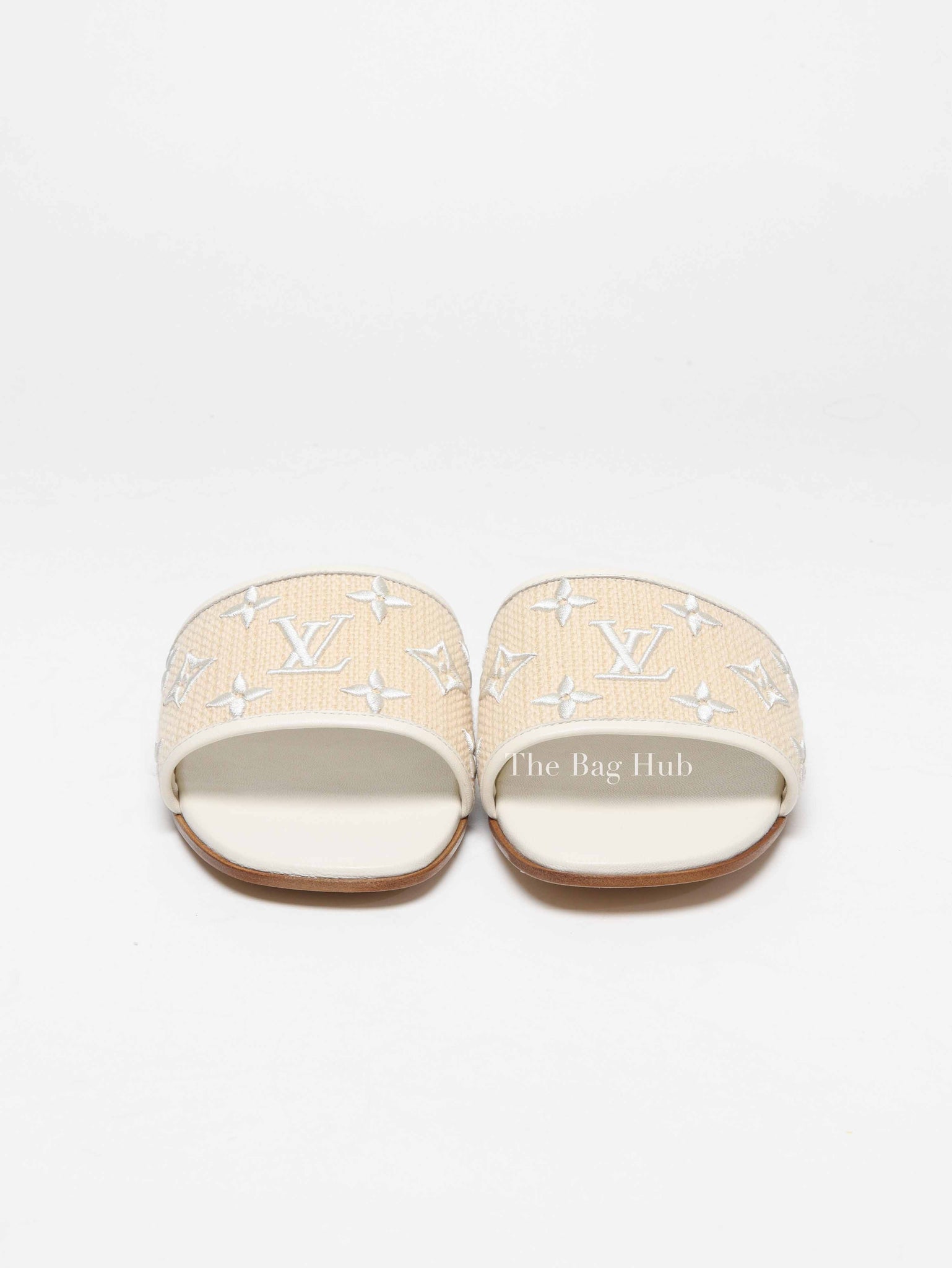 Louis Vuitton White Monogram Embossed Canvas Revival Flat Mules Size 39