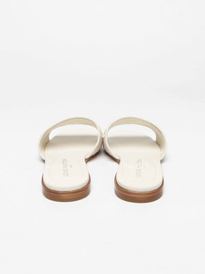 Louis Vuitton White Monogram Embossed Canvas Revival Flat Mules Size 39