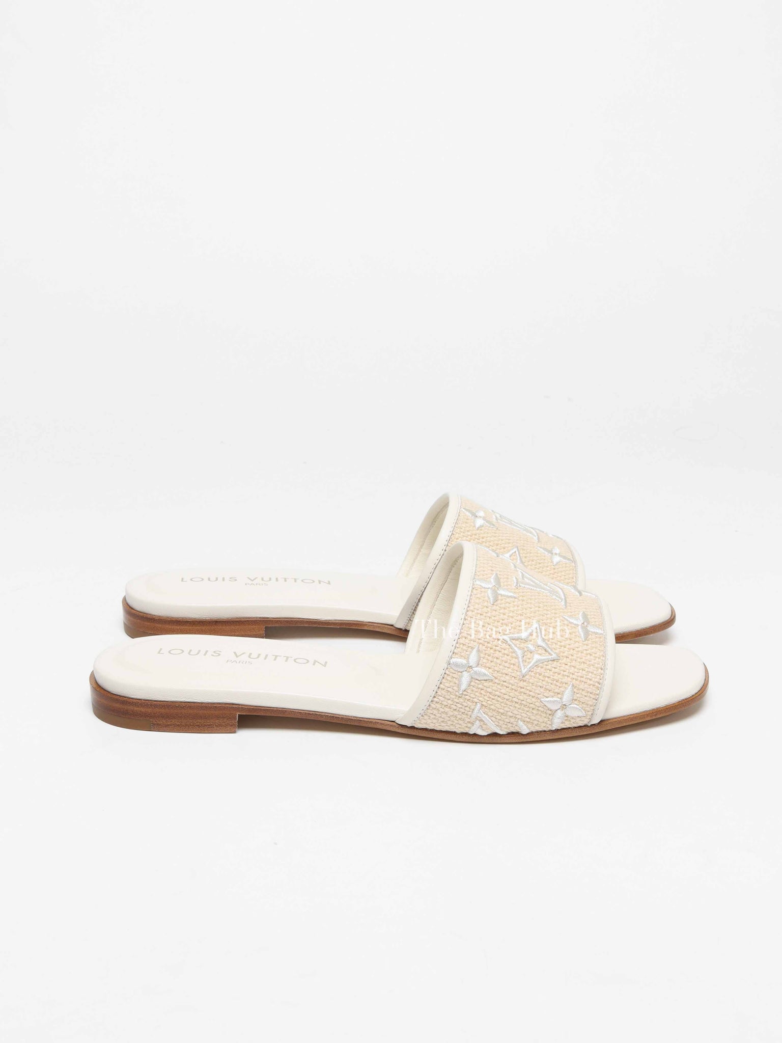 Louis Vuitton White Monogram Embossed Canvas Revival Flat Mules Size 39