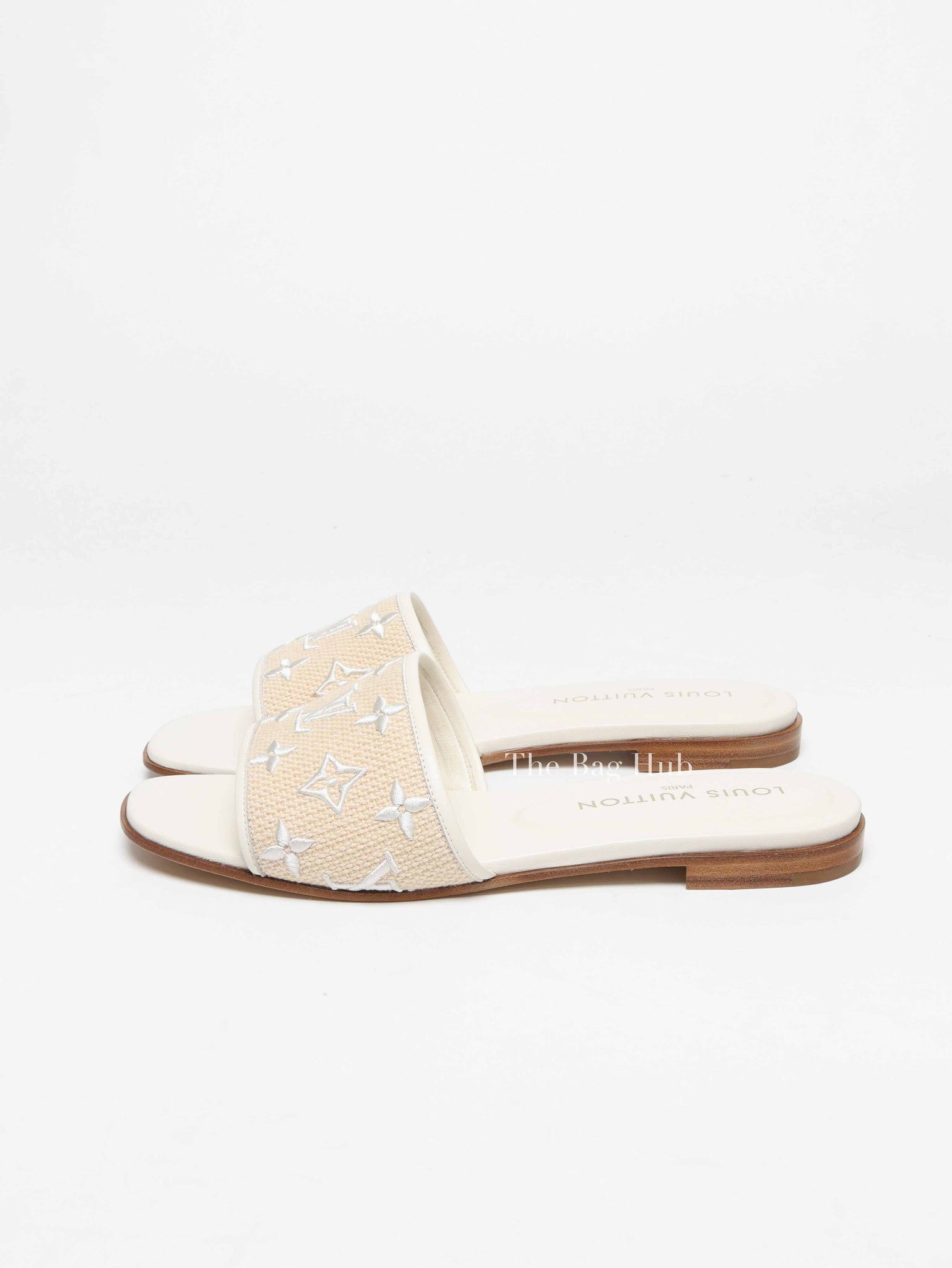 Louis Vuitton White Monogram Embossed Canvas Revival Flat Mules Size 39