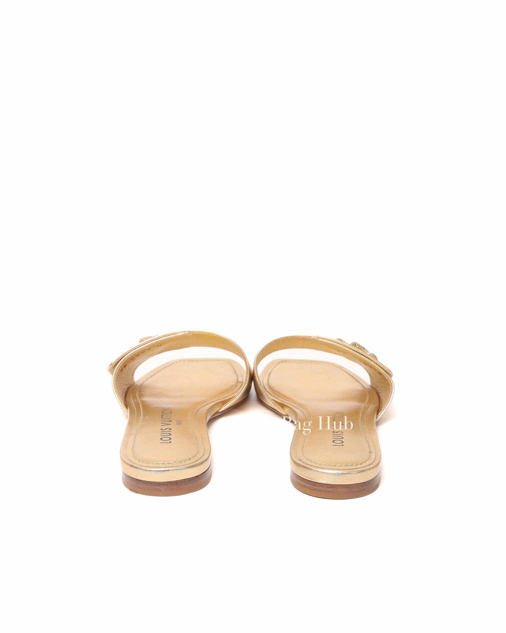 Louis Vuitton Gold Metallic Leather Twist Flat Mules Size 36