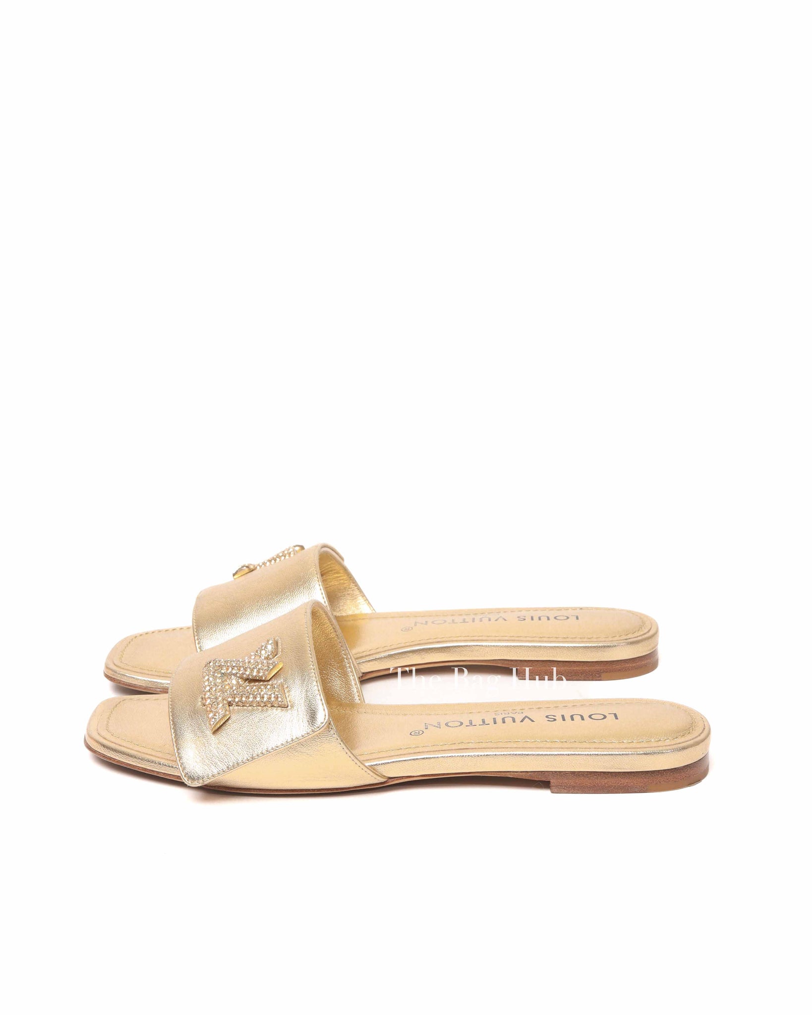 Louis Vuitton Gold Metallic Leather Twist Flat Mules Size 36