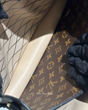 Louis Vuitton Reverse Monogram Trunk Clutch Bag