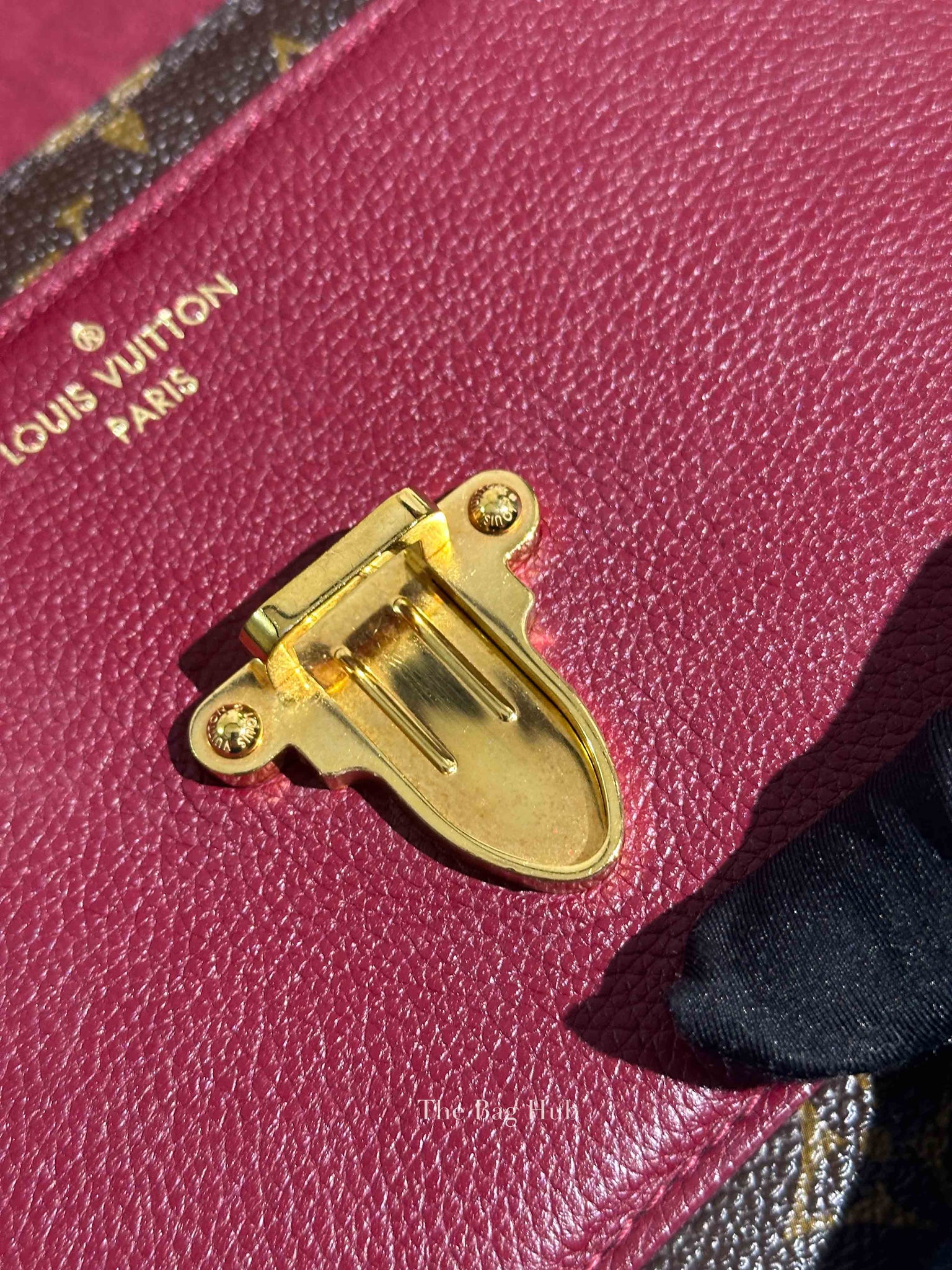 Louis Vuitton Monogram Canvas Raisin Victoire Bag