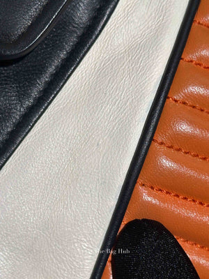 Miu Miu Black/White/Orange Leather Clutch Bag