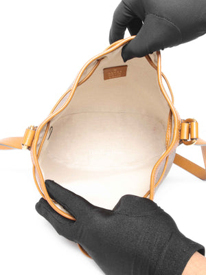 Gucci X Disney Beige Vintage Sun Oil Mini Vintage GG Supreme Monogram Bucket Bag