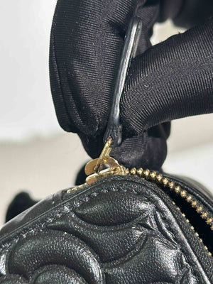 Chanel Black Lambskin Camelia Embossed Small Vanity Bag