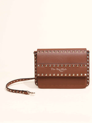 Valentino Garavani Brown Pebbled Calfskin Rockstud Small Crossbody Bag