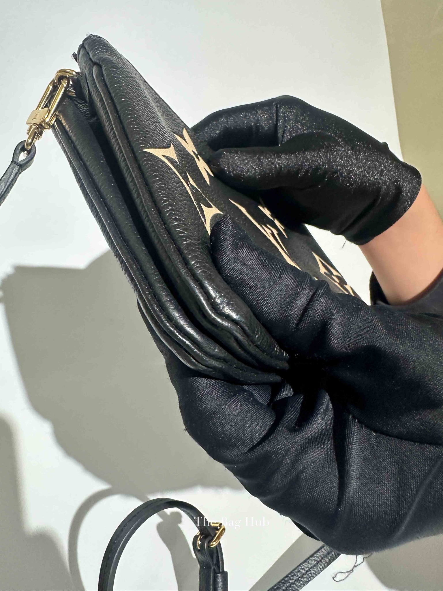 Louis Vuitton Black/Cream Empreinte Monogram Giant Double Zip Pochette