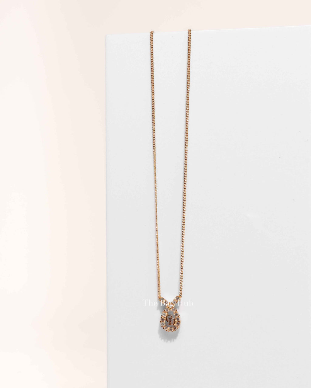 Dior Gold-Tone Metal Crystal Embellished Ribbon Pendant Necklace