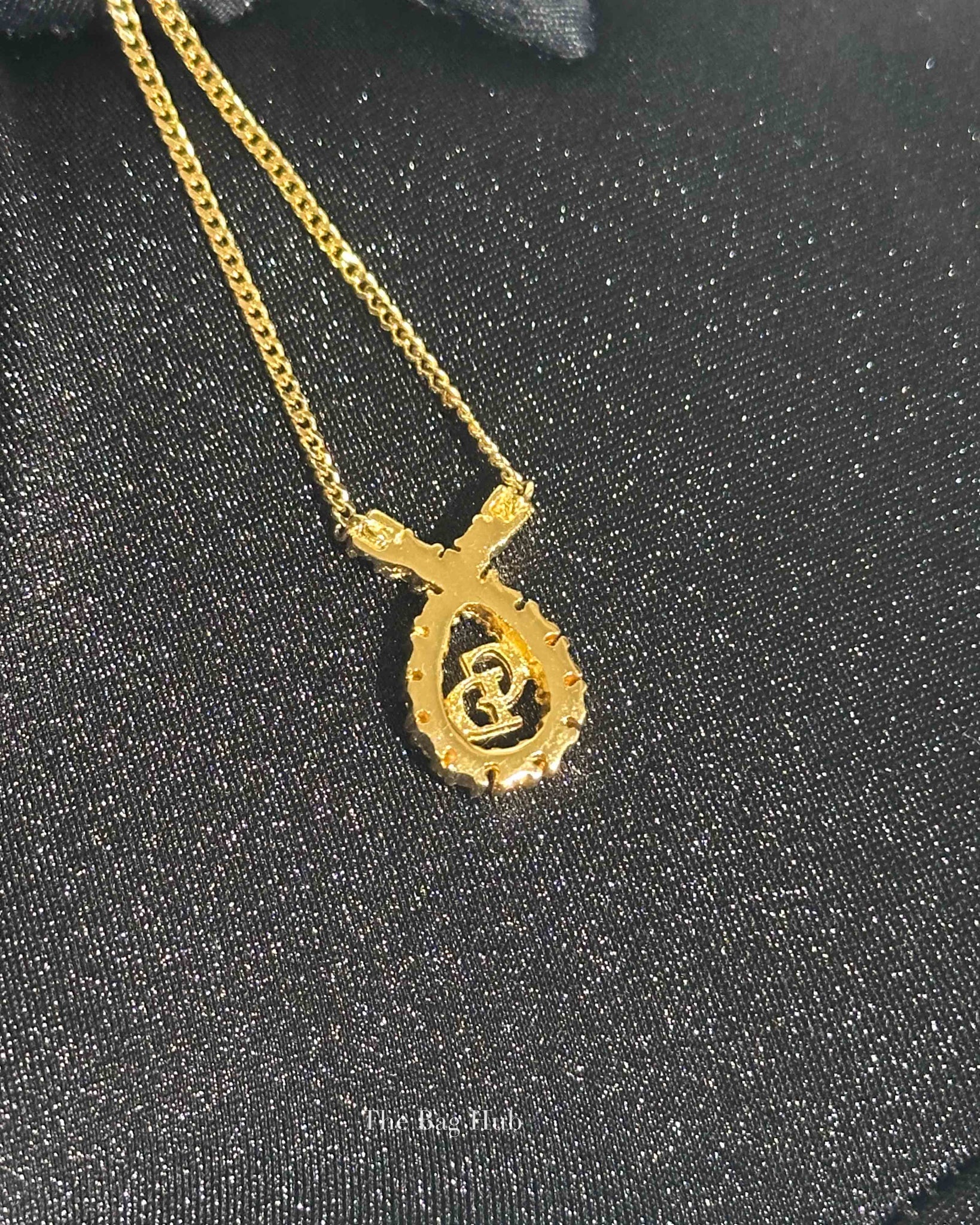 Dior Gold-Tone Metal Crystal Embellished Ribbon Pendant Necklace