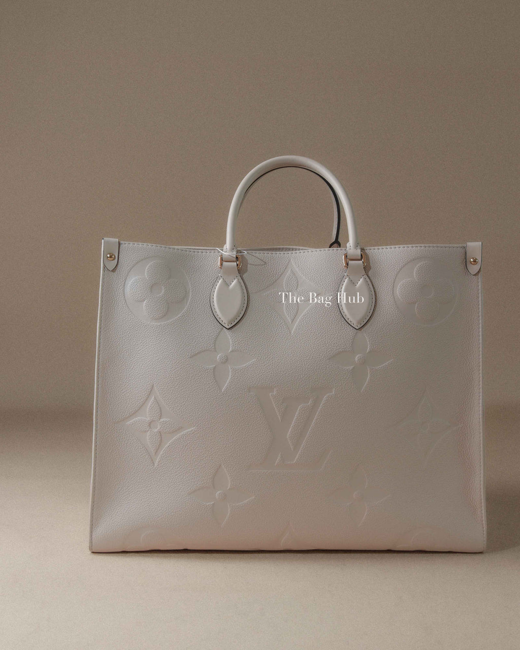 Louis Vuitton Cream Monogram Empreinte Leather OnTheGo GM Bag