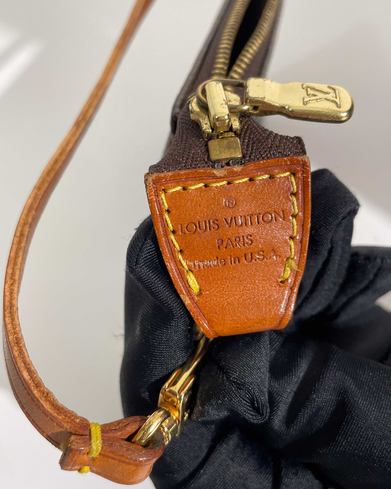 Pochette accessoire leather handbag Louis Vuitton Black in Leather -  25699413