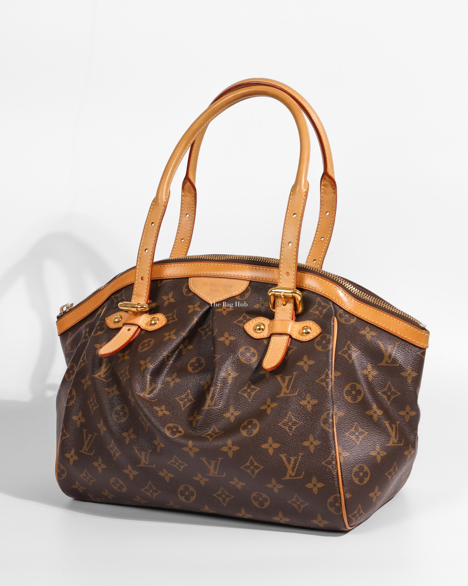 Louis Vuitton 2014 preowned Monogram Tivoli PM Handbag  Farfetch